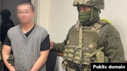 The 22-year-old Kazakh man is suspected of joining an armed group in Syria. 