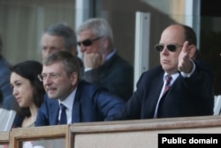 Татьяна Бершеда, Дмитрий Рыболовлев и князь Монако Альбер II на футбольном матче. 4 мая 2013 г.