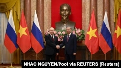 Президент Росії Володимир Путін і президент В'єтнаму То Лам у президентському палаці в Ханої. В'єтнам, 20 червня 2024 року
