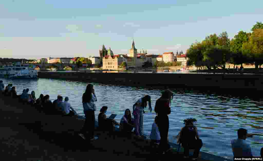 Attendees of the festival sit alongside tourists and locals enjoying the summer evening on July 8. Vesela said that soon after the 2022 invasion: &ldquo;I thought maybe I can make some event that will show our culture to the world, because ours is similar to Czech culture. These are Slavic traditions.&quot; &nbsp;