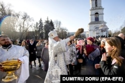 Metropolitan Vladimir of Chisinau and all Moldova attends a service for Orthodox Epiphany celebrations in the Nasterea Domnului Cathedral in Chisinau in January.