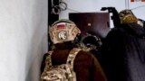 Бойцы спецназа во время контртеррористической операции в Дагестане, 31 марта 2024 г. 