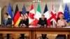 Canadian Prime Minister Justin Trudeau, Italian Prime Minister Giorgia Meloni, Ukrainian President Volodymyr Zelenskiy, and European Commission President Ursula von der Leyen join the virtual G7 leaders' meeting from Kyiv on February 24.