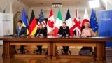 Президент України Володимир Зеленський (другий справа) під час відеоконференції лідерів країн «Групи семи» (G7). Київ, 24 лютого 2024 року