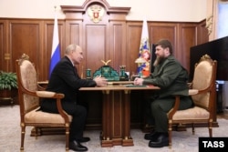 Президент РФ Владимир Путин и глава Чечни Рамзан Кадыров во время встречи в Кремле. Москва. 28 сентября 2023 года