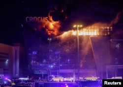 Концертний зал «Крокус Сіті Хол» на околиці Москви, в якому внаслідок збройного нападу почалася велика пожежа, 22 березня 2024 року