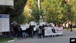 Students from the Sharif University of Technology attend a protest sparked by the death of 22-year-old Mahsa Amini in police custody last year. (file photo) 