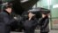 Ким Чен Ын с дочерью на военном заводе, архивное фото