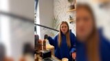 Grab: Ukraine -- barista works after missile impact, Kyiv, March 25, 2024