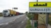 Dozens of trucks pass through the village of Giurgiulesti in the south of Moldova every day.