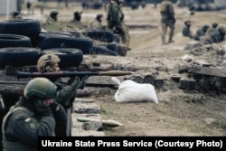 Bureviy Brigade troops train in the Kyiv region.