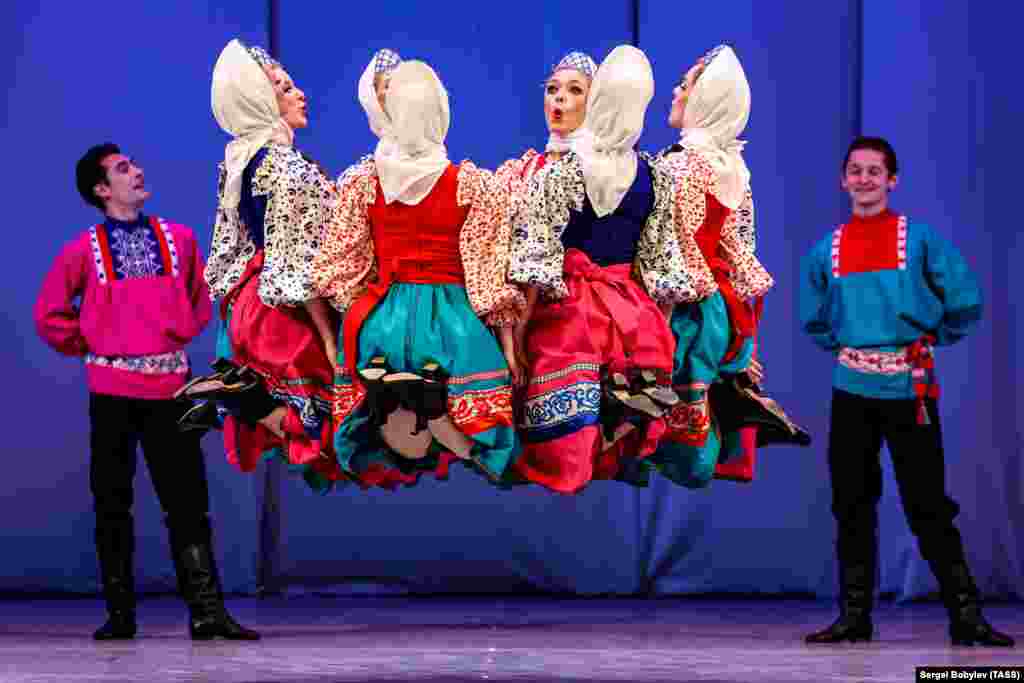 Members of the Berezka State Academic Choreographic Ensemble perform during a concert to mark its 75th birthday at the Tchaikovsky Concert Hall in Moscow.