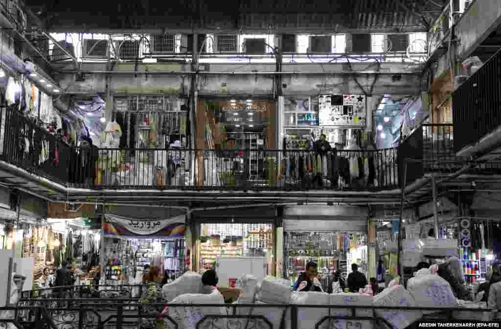 Iranians shop at the Grand Bazaar in Tehran.