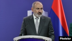 Armenian Prime Minister Nikol Pashinianspeaks to the media in Brussels on April 5.