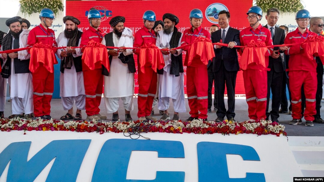 Afghan and Chinese officials attend a ribbon-cutting ceremony to inaugurate the Mes Aynak copper-mining project on July 24.