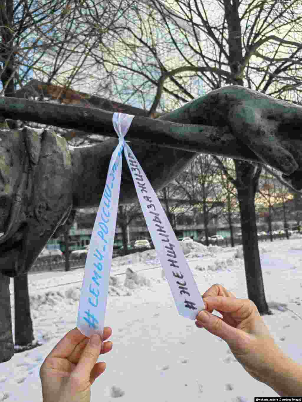 The father of the woman tying these ribbons was drafted into the Russian military according to one post on the channel. The ribbons feature the phrases &ldquo;Russian families for peace&rdquo; and &ldquo;Women for life&rdquo; &nbsp;