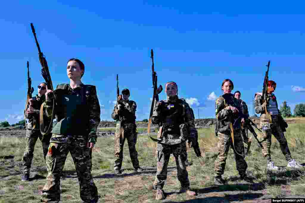 Female Ukrainian cadets, wearing new military uniforms designed specially for women, attend the &quot;Uniform Matters&quot; event organized to present and test the outfit under military training conditions on the outskirts of Kyiv.