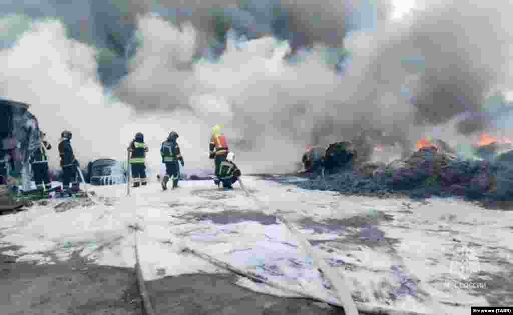 Firefighters battle a tire warehouse fire in St. Petersburg on July 5.&nbsp;