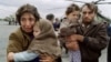 Փախստական ընտանիքը ուղղաթիռով Արցախից ժամանում է Երևան, 13-ը մայիսի, 1991թ.