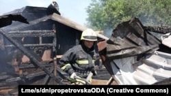 A rescue worker at the site of a deadly Russian attack on Dnipro on July 3.