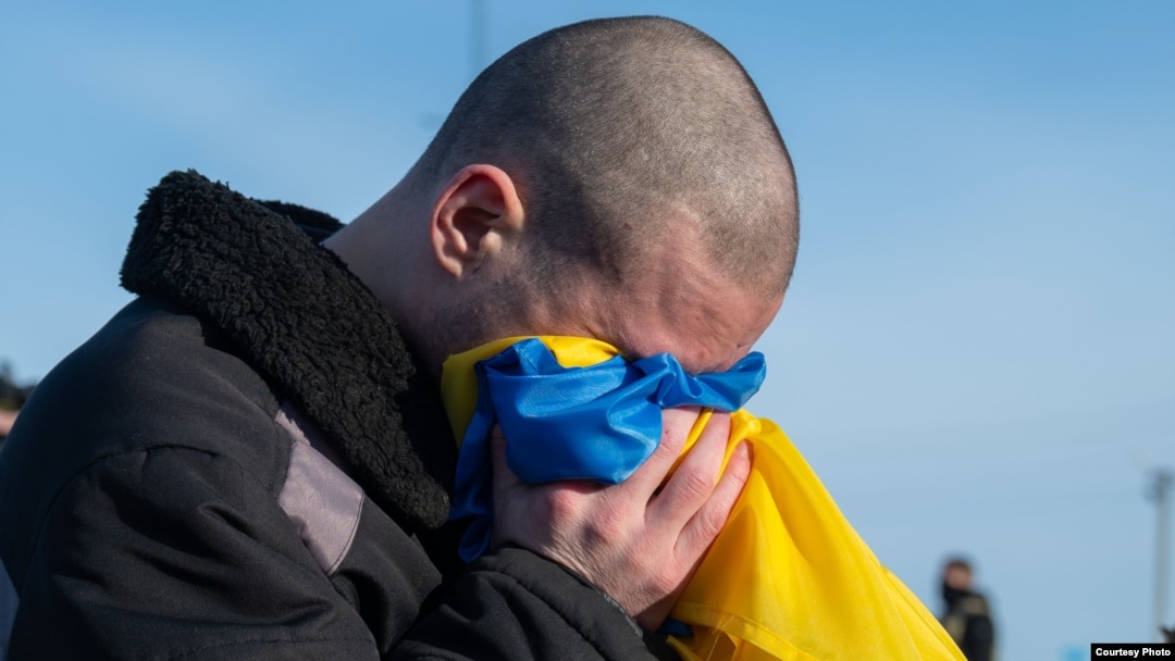 A Ukrainian POW reacts after being swapped in a prisoner exchange with Russia on January 31. 