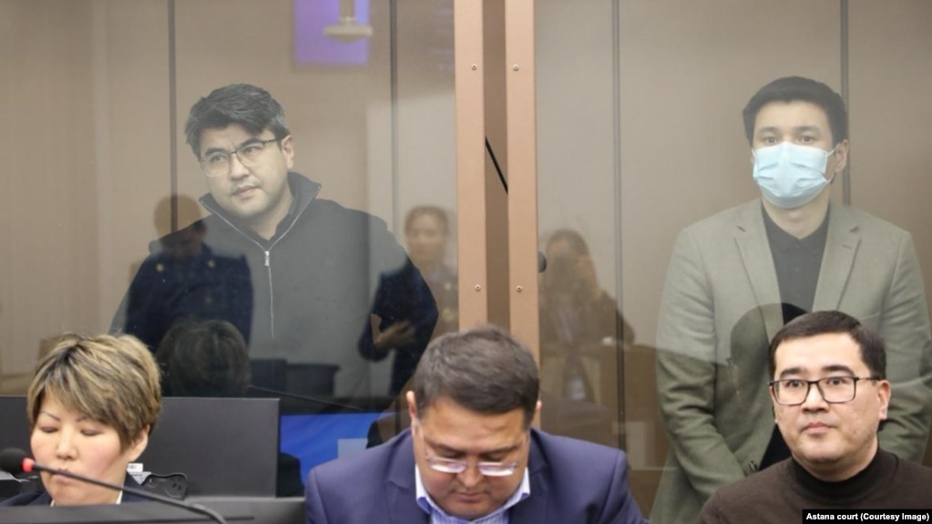 Quandyq Bishimbaev (top left) and Baqytzhan Baizhanov are seen in a courtroom in Astana on March 12.