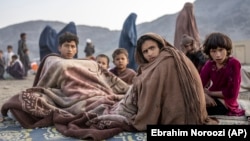 خانواده های مهاجر افغان که از پاکستان اخراج شده اند 