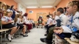 UKRAINE -- Children mark the start of the new school year, known as the 'Day of Knowledge,' at an underground school in Kharkiv, Ukraine, 02 September 2024
