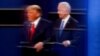 Отражения кандидатов в президенты США Дональда Трампа и Джо Байдена во время съемок вторых дебатов президентской кампании 2020 года в в Нэшвилле, штат Теннесси, США, 22 октября 2020 года