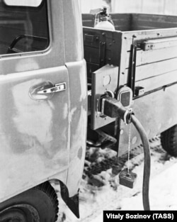 A Soviet-made electric vehicle prototype being charged in Moscow in February 1974.