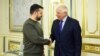 Ukrainian President Volodymyr Zelenskiy shakes hand with EU foreign policy chief Josep Borrell in Kyiv on February 7.