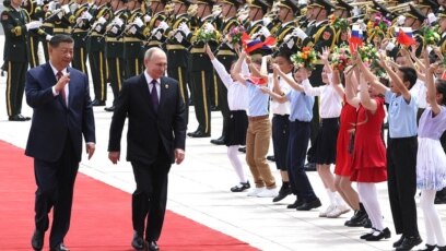 Руският президент Владимир Путин и китайският лидер Си Дзинпин казаха