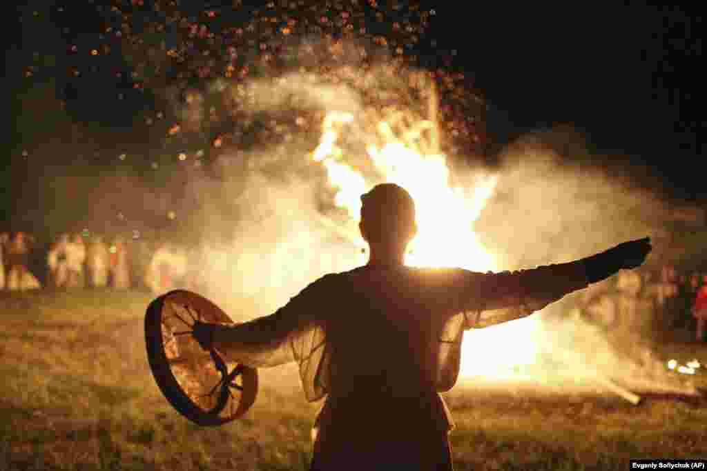 Residents of the Siberian village of Okunevo celebrate the summer solstice on June 21.&nbsp;