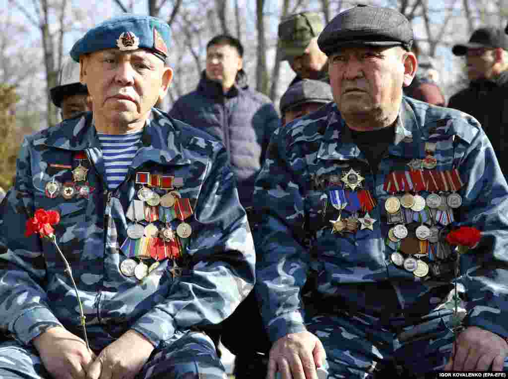 Soldiers attend a memorial service for servicemen killed in Afghanistan, in Bishkek on February 15.