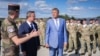 Romanian President Klaus Iohannis and Luxembourg Prime Minister Xavier Bettel visit the NATO base in Cincu, Romania, on September 5.