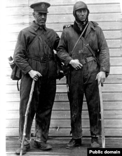 Major Martin and Sergeant Harvey shown after the crash of their plane, the Seattle, and a days-long ordeal in the Alaskan wilderness.