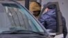 Evan Gershkovich leaves a court building in Moscow on March 30.