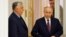 Hungarian Prime Minister Viktor Orban (left) and Russian President Vladimir Putin meet in Moscow on July 5.