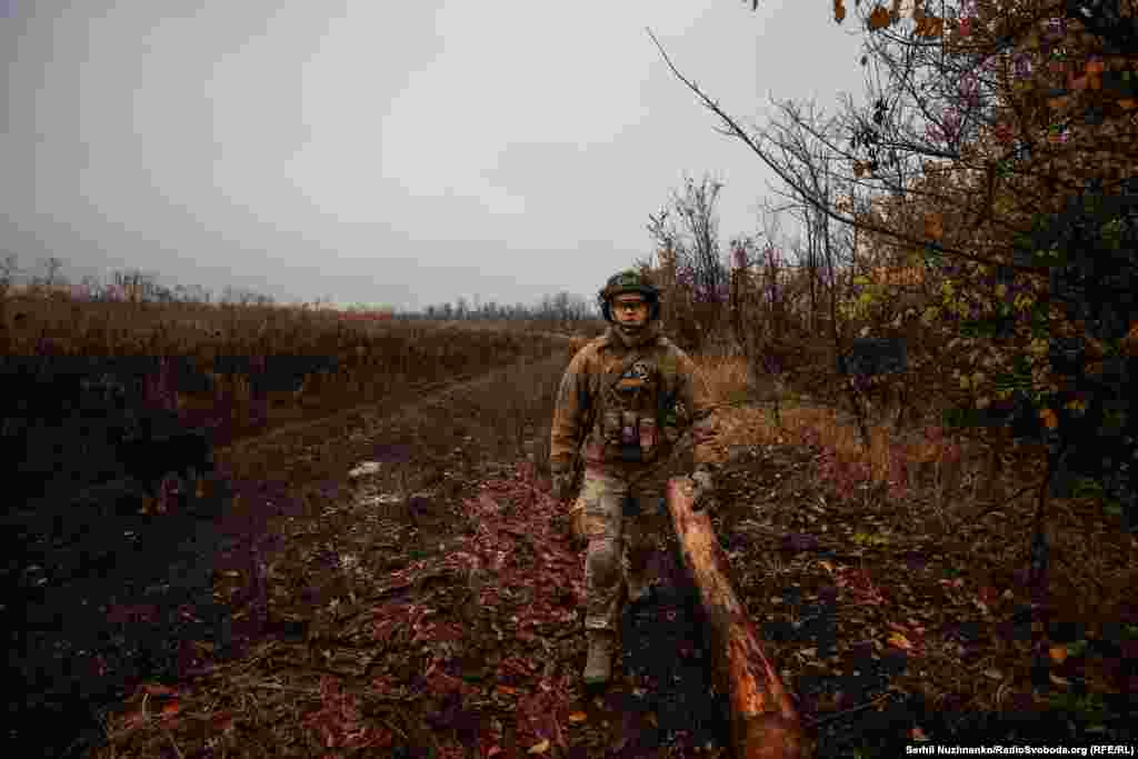A member of the assault brigade walks the perimeter. Large-scale attacks are becoming less successful as both sides rely on drones, night-vision equipment, and electronic signal intelligence to monitor troop advances. Kyiv says Russian forces are continuing their effort to encircle&nbsp;the&nbsp;eastern city of Avdiyivka, however. &nbsp;