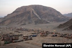 Afghan refugees settle in a camp near the Torkham border crossing in Afghanistan on November 3.