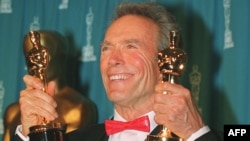  Клинт Истууд с двата си 