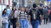 Belgrade, Serbia -- Young people are walking down the street, 10 November