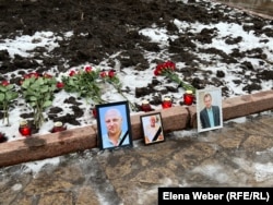 Some of the victims of the Kostenko coal-mine fire are seen at a makeshift memorial in early December in Qaraghandy.