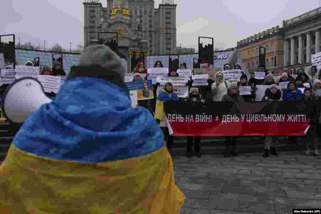 A protester addresses a crowd during a meeting on Independence Square in Kyiv.