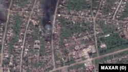 На супутниковому знімку видно пошкоджені будівлі в Бахмуті, 15 травня 2023 року.