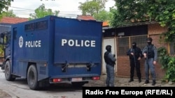 Kosovar police officers guard the municipality of Zvecan on May 27.
