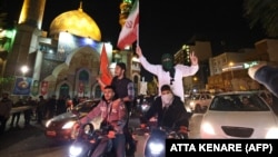 İranın İsrailə hücumundan sonra Tehrandakı Fələstin meydanına toplaşan nümayişçilər