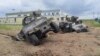 This image, showing U.S.-made Humvees in an apparent explosion crater, is from a video released by Russian authorities on May 23 after what is described as a cross-border raid into Russia&#39;s Belgorod region that began a day earlier.