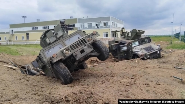 Humvees, Wreckage After 'Cross-Border Raid' Into Russia
