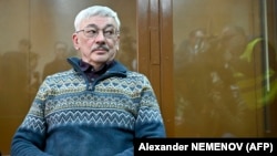 Oleg Orlov, the 70-year-old human rights campaigner and co-chairman of the Nobel Prize-winning Memorial group, who is charged with repeatedly "discrediting" the Russian Army, attends his verdict hearing in Moscow on February 27.